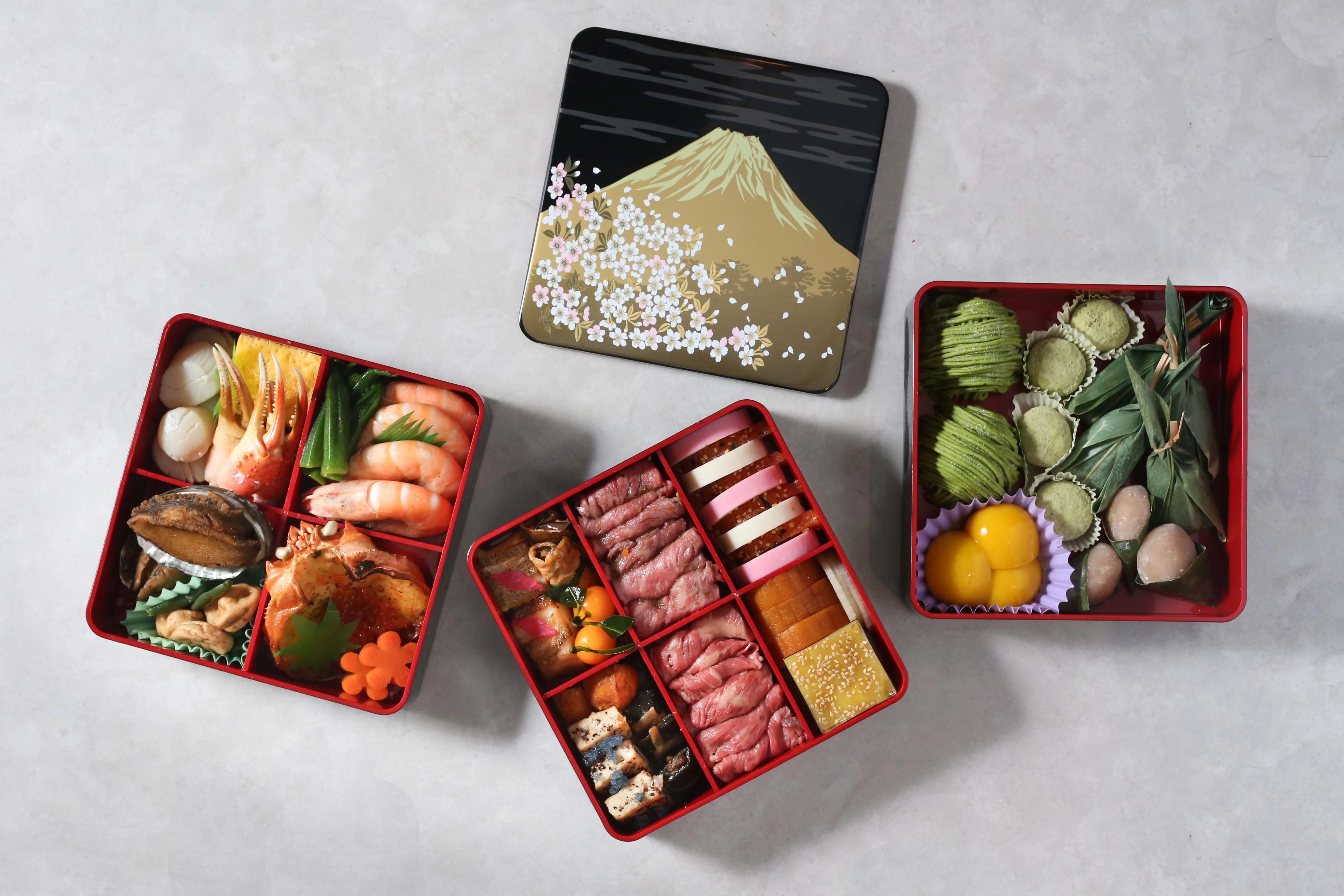 Overhead shot of colorful osechi ryori for Japanese New Year.